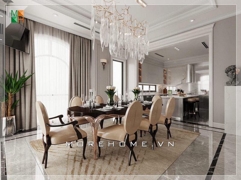 Thiết kế không gian phòng bếp liền phòng ăn rất rộng rãi và thoáng mát, sử dụng đèn chùm treo giữa không gian bàn ăn mang đậm chút tân cổ điện rất đẳng cấp.